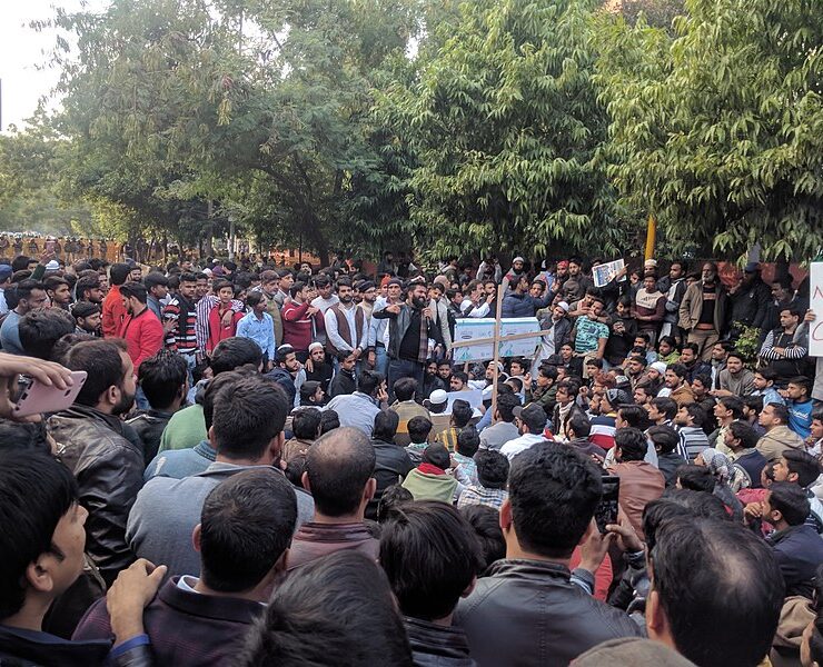 800px-JMI_students_and_locals_protesting_against_CAA_NRC